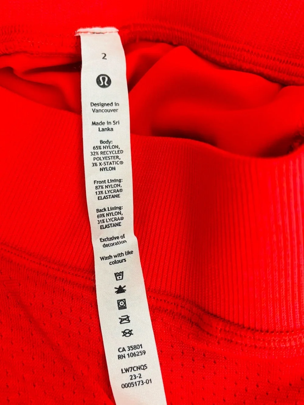 Lululemon lightweight high rise tennis skirt in tomato red orange. Size 2